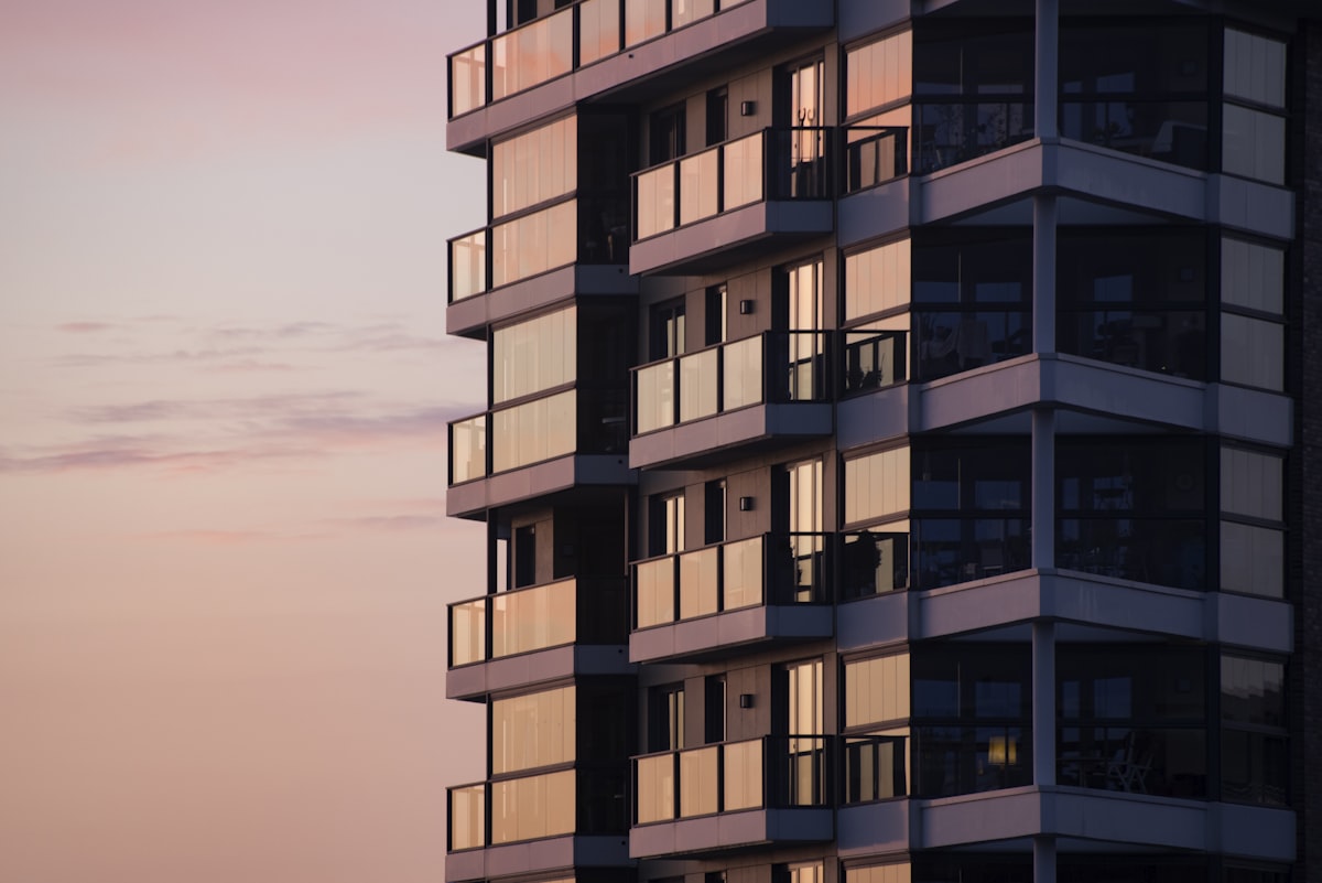 White concrete building during the day, a symbol of transparency